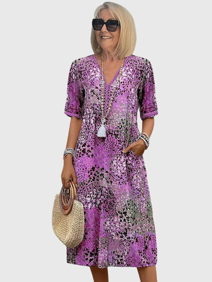 Krásna | Elegantné kvetinové midi šaty