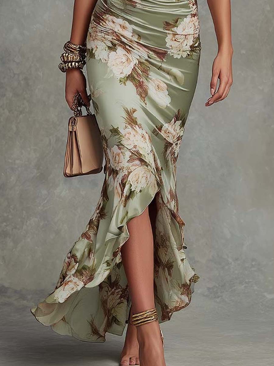 Anna - Long asymmetrical green satin dress with a V-neckline, puff sleeves and a floral print